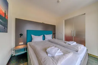 Ein Bett oder Betten in einem Zimmer der Unterkunft Resort Deichgraf Resort Deichgraf 27-08