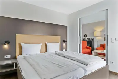 Ein Bett oder Betten in einem Zimmer der Unterkunft Resort Deichgraf Resort Deichgraf 27-10
