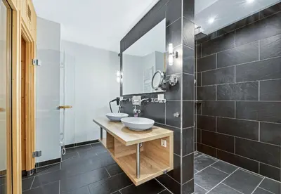 Ein Badezimmer in der Unterkunft Resort Deichgraf Resort Deichgraf 27-10