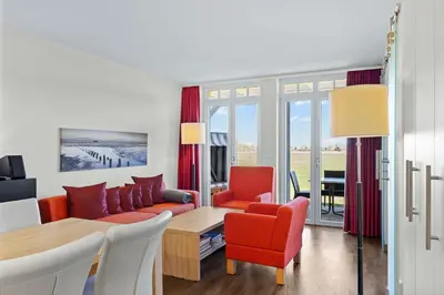 Ein Sitzbereich in der Unterkunft Resort Deichgraf Resort Deichgraf 31-03