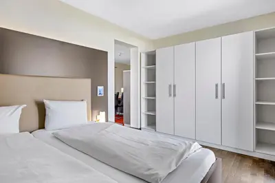 Ein Bett oder Betten in einem Zimmer der Unterkunft Resort Deichgraf Resort Deichgraf 31-08
