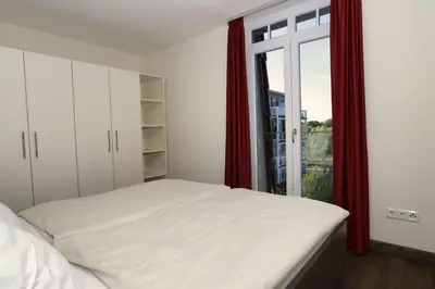 Ein Bett oder Betten in einem Zimmer der Unterkunft Resort Deichgraf Resort Deichgraf 31-12