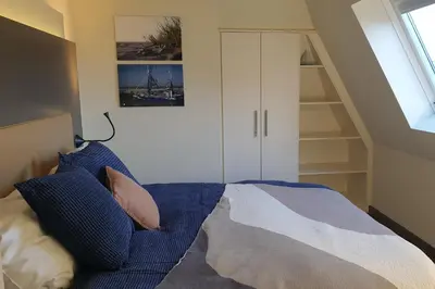 Ein Bett oder Betten in einem Zimmer der Unterkunft Resort Deichgraf Resort Deichgraf 31-18