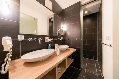 Ein Badezimmer in der Unterkunft Resort Deichgraf Resort Deichgraf 31-20