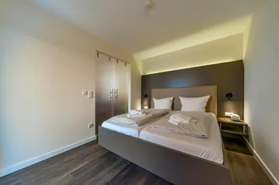 Ein Bett oder Betten in einem Zimmer der Unterkunft Resort Deichgraf Resort Deichgraf 27-05