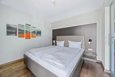 Ein Bett oder Betten in einem Zimmer der Unterkunft Resort Deichgraf Resort Deichgraf 31-13