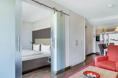Ein Bett oder Betten in einem Zimmer der Unterkunft Resort Deichgraf Resort Deichgraf 31-13