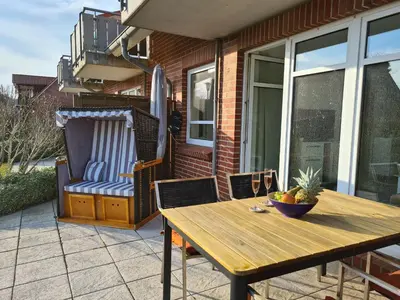 Ein Balkon oder eine Terrasse in der Unterkunft Watt will man Meer