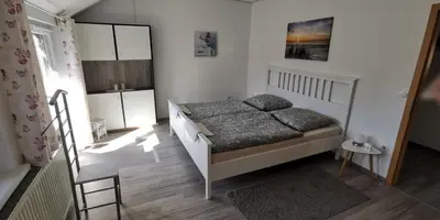 Ein Bett oder Betten in einem Zimmer der Unterkunft Ankes Ferienwohnung