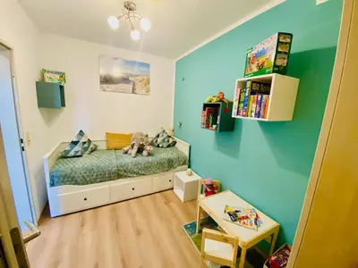 Ein Bett oder Betten in einem Zimmer der Unterkunft Strandnixe Cuxhaven