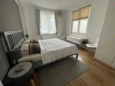 Ein Bett oder Betten in einem Zimmer der Unterkunft Fewo Grünstrand