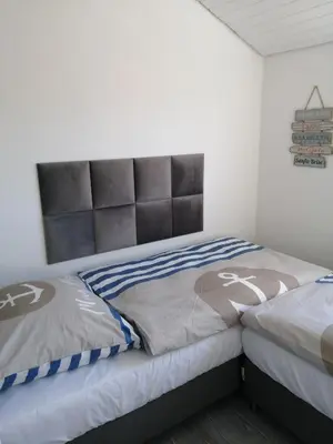 Ein Bett oder Betten in einem Zimmer der Unterkunft Bude im Windrosenweg