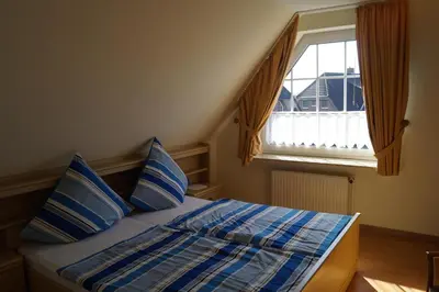 Ein Bett oder Betten in einem Zimmer der Unterkunft Haus Katharina Ferienwohnung 1