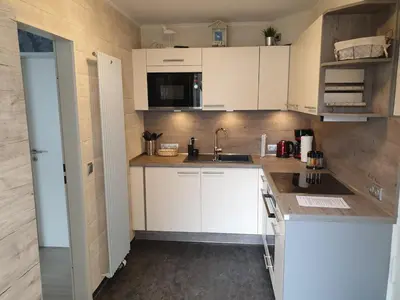 Küche/Küchenzeile in der Unterkunft Strandstraße 51a, FeWo Marina