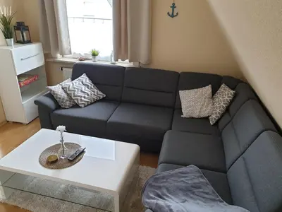 Ein Sitzbereich in der Unterkunft Strandstraße 51a, FeWo Piratennest
