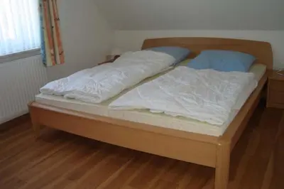 Ein Bett oder Betten in einem Zimmer der Unterkunft Am grooten Steen 20, Ferienwohnung 2