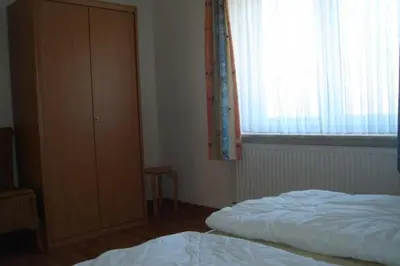 Ein Bett oder Betten in einem Zimmer der Unterkunft Am grooten Steen 20, Ferienwohnung 2