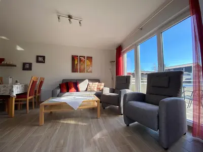 Ein Sitzbereich in der Unterkunft Dünenwind, Ferienwohnung 1