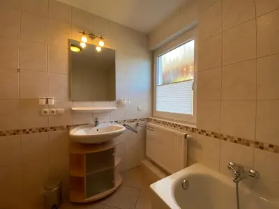 Ein Badezimmer in der Unterkunft Dünenwind, Ferienwohnung 1