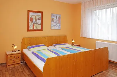 Ein Bett oder Betten in einem Zimmer der Unterkunft Haus Apart, Whg 2