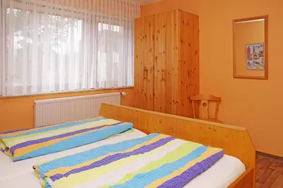 Ein Bett oder Betten in einem Zimmer der Unterkunft Haus Apart, Whg 2