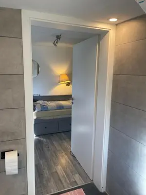 Ein Bett oder Betten in einem Zimmer der Unterkunft Haus Seefalke - 250 m zum Meer