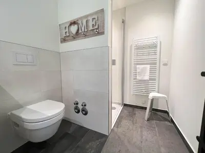 Ein Badezimmer in der Unterkunft Haus Strandläufer Apartment 3 5 Strandgut