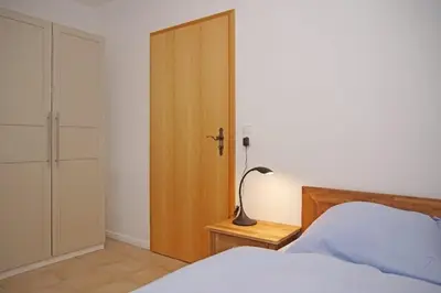Ein Bett oder Betten in einem Zimmer der Unterkunft Haus Felix, Whg 7