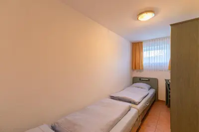 Ein Bett oder Betten in einem Zimmer der Unterkunft Haus Knechtsand, Whg 401