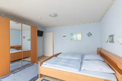 Ein Bett oder Betten in einem Zimmer der Unterkunft Haus Knechtsand, Whg 439