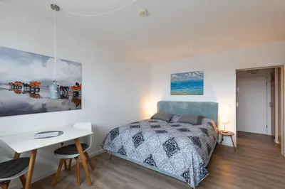 Ein Bett oder Betten in einem Zimmer der Unterkunft Haus Knechtsand, Whg 447
