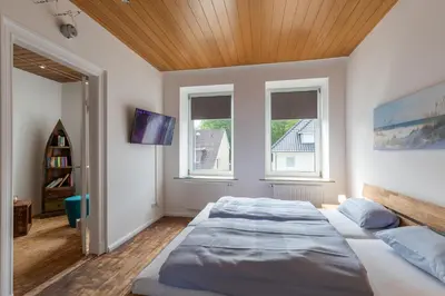 Ein Bett oder Betten in einem Zimmer der Unterkunft Haus Relax, Whg 3