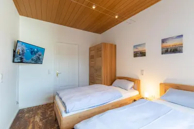 Ein Bett oder Betten in einem Zimmer der Unterkunft Haus Relax, Whg 3