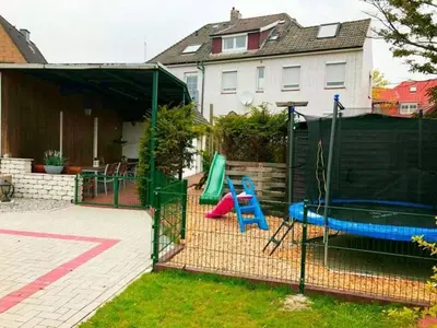 Ein Kinderspielbereich in der Unterkunft Haus Strandkrabbe, Seehund