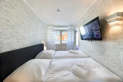 Ein Bett oder Betten in einem Zimmer der Unterkunft Frische Brise - 211