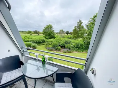 Ein Balkon oder eine Terrasse in der Unterkunft Haus Essen Duhnen Wohnung 10