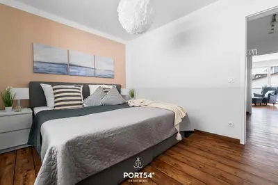 Ein Bett oder Betten in einem Zimmer der Unterkunft Möwennest Büsum