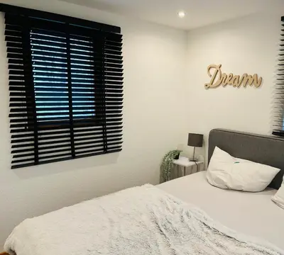 Ein Bett oder Betten in einem Zimmer der Unterkunft Dat Blockhus am Diek