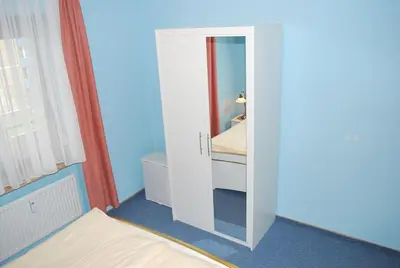 Ein Bett oder Betten in einem Zimmer der Unterkunft Haus Nordseeblick Wohnung 38