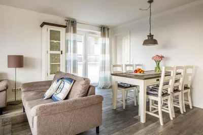 Ein Sitzbereich in der Unterkunft Haus Deichkieker Apartment 2 1 Grothus