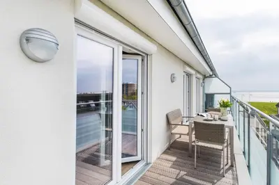 Ein Balkon oder eine Terrasse in der Unterkunft Haus Deichkieker Apartment 4 3 Deichgut