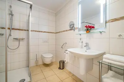 Ein Badezimmer in der Unterkunft Haus Seehafen Apartment 0 4