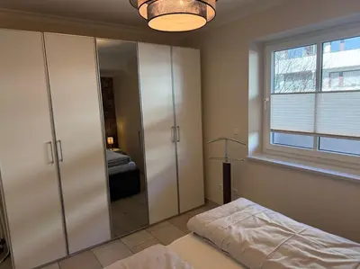 Ein Bett oder Betten in einem Zimmer der Unterkunft Haus Seehafen Apartment 1 2