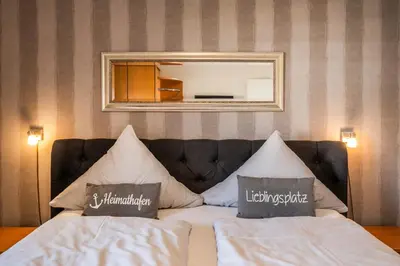 Ein Bett oder Betten in einem Zimmer der Unterkunft Haus Seewärts Wohnen Apartment 3 5