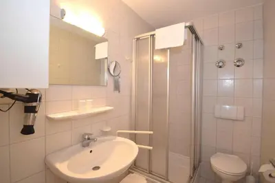 Ein Badezimmer in der Unterkunft Haus Seemeile Wohnung 3 8