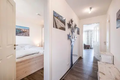 Ein Bett oder Betten in einem Zimmer der Unterkunft Haus Deichkieker Apartment 1 4