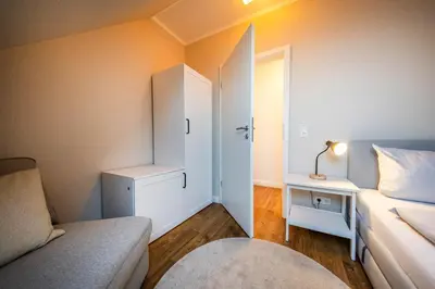 Ein Bett oder Betten in einem Zimmer der Unterkunft Haus Am Anker Wohnung 9