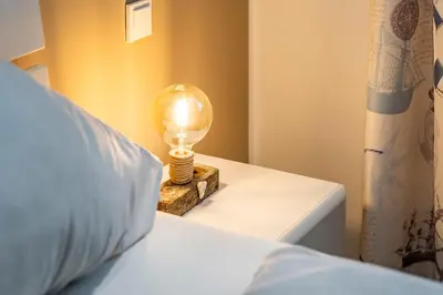 Ein Bett oder Betten in einem Zimmer der Unterkunft Haus Strandläufer Apartment 1 3 Büsumer Sprotte