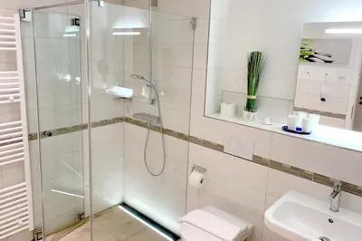 Ein Badezimmer in der Unterkunft Haus Deichkieker Apartment 1 3 Seeluft