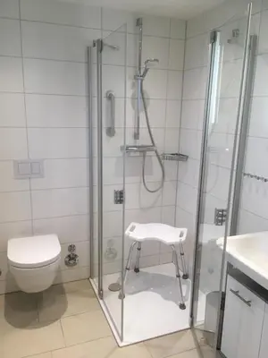 Ein Badezimmer in der Unterkunft Haus Strandläufer Apartment 3 6 Watt'n Blick
